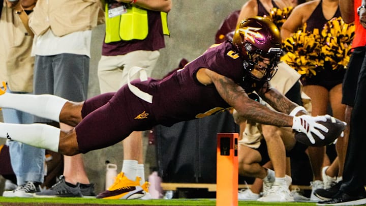 Sep 13, 2025; Tempe, Arizona, USA; Arizona State Sun Devils wide receiver Jordyn Tyson (0) dives into the end zone in the second quarter of the game between Arizona State Sun Devils and Texas State Bobcats. Mandatory Credit: Arianna Grainey-Imagn Images Sep 13, 2025; Tempe, Arizona, USA; Arizona State Sun Devils wide receiver Jordyn Tyson (0) dives into the end zone in the second quarter of the game between Arizona State Sun Devils and Texas State Bobcats. Mandatory Credit: Arianna Grainey-Imagn Images