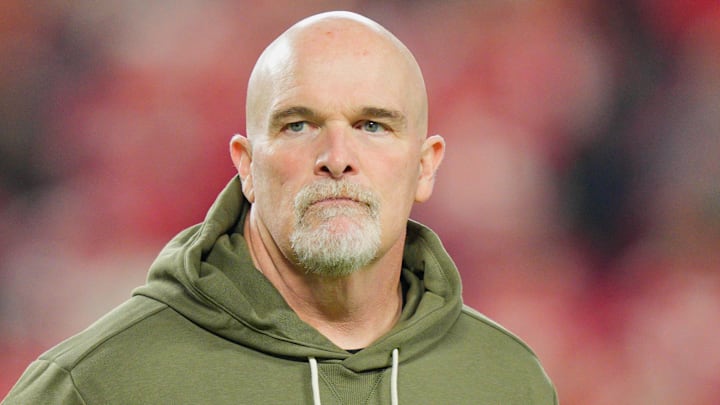 Oct 27, 2025; Kansas City, Missouri, USA; Washington Commanders head coach Dan Quinn looks on during warmups prior to the game against the Kansas City Chiefs at GEHA Field at Arrowhead Stadium. Mandatory Credit: Jay Biggerstaff-Imagn Images