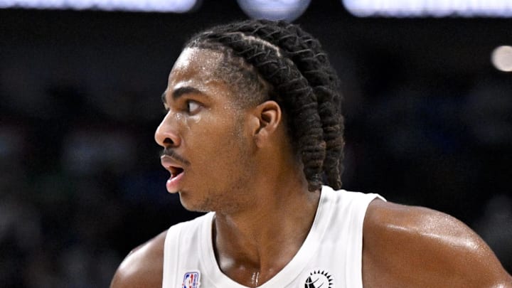 Toronto Raptors forward Collin Murray-Boyles brings the ball up court against the Dallas Mavericks.