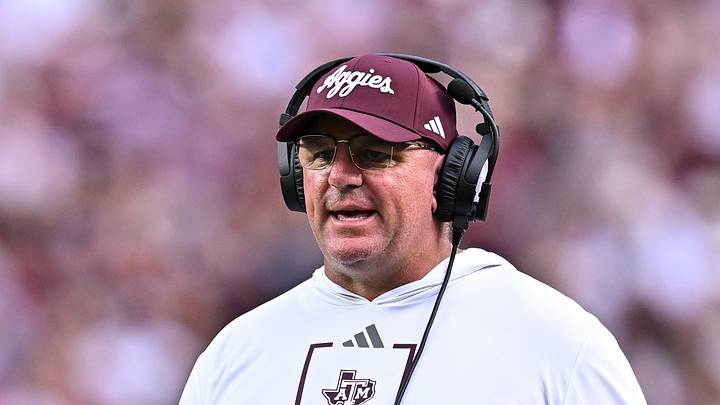 Texas A&M Aggies head coach Mike Elko walks onto the field during a time-out in the first quarter against the Missouri State Bears at Kyle Field. Texas A&M Aggies head coach Mike Elko walks onto the field during a time-out in the first quarter against the Missouri State Bears at Kyle Field.