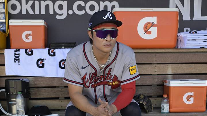 Oct 3, 2026; Los Angeles, California, USA;  Atlanta Braves shortstop Ha-Seong Kim (7) sits in the dugout before game one of the NLDS against the Los Angeles Dodgers for the 2026 MLB Playoffs at Uniqlo Field at Dodger Stadium.  Mandatory Credit: Jayne Kamin-Oncea-Imagn Images