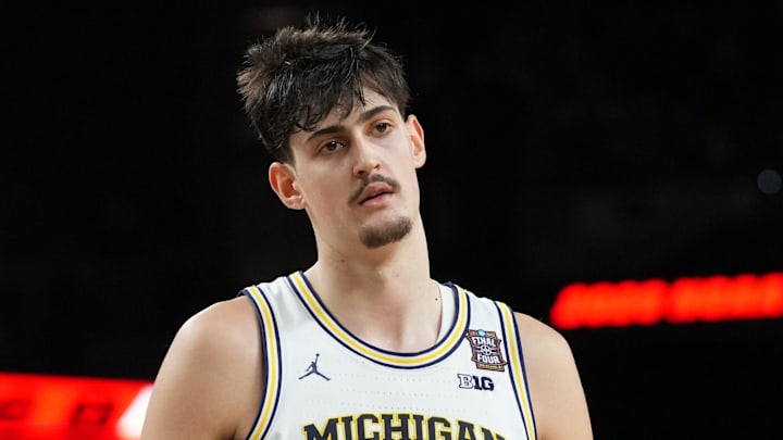 Michigan Wolverines center Aday Mara (15) reacts after a play against the UConn Huskies during the first half in the national championship of the Final Four at Lucas Oil Stadium on April 6, 2026.