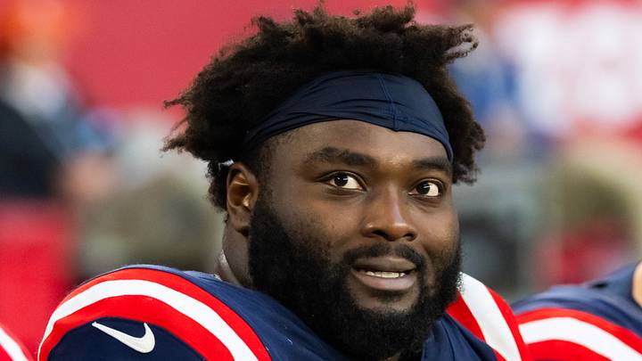 Dec 15, 2024; Glendale, Arizona, USA; New England Patriots offensive tackle Mike Onwenu (71) against the Arizona Cardinals at State Farm Stadium. Mandatory Credit: Mark J. Rebilas-Imagn Images Dec 15, 2024; Glendale, Arizona, USA; New England Patriots offensive tackle Mike Onwenu (71) against the Arizona Cardinals at State Farm Stadium. Mandatory Credit: Mark J. Rebilas-Imagn Images