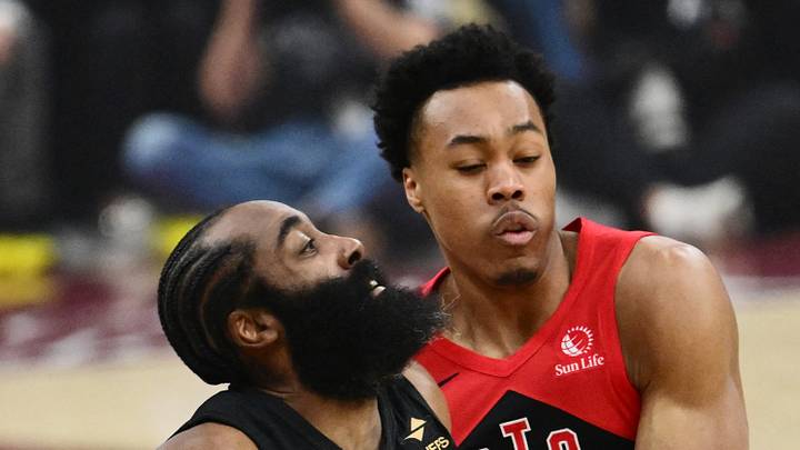Cleveland Cavaliers guard James Harden drives to the basket against Toronto Raptors forward Scottie Barnes. Cleveland Cavaliers guard James Harden drives to the basket against Toronto Raptors forward Scottie Barnes.