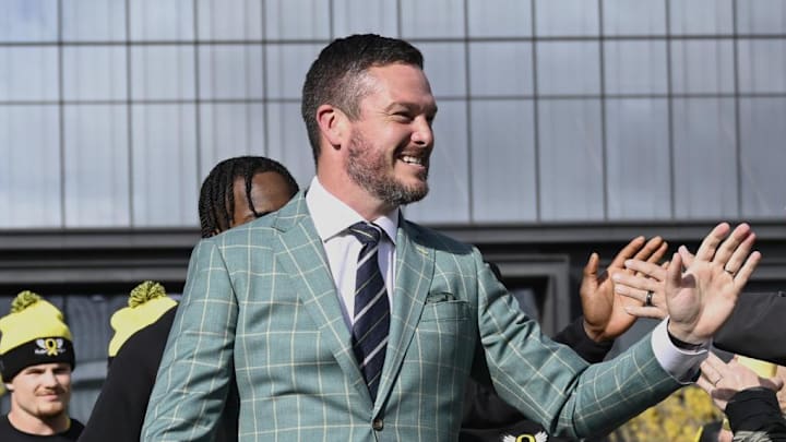 Oct 4, 2024; Eugene, Oregon, USA; Oregon Ducks head coach Dan Lanning high-fives fans before a game against the Michigan State Spartans at Autzen Stadium. Mandatory Credit: Troy Wayrynen-Imagn Images