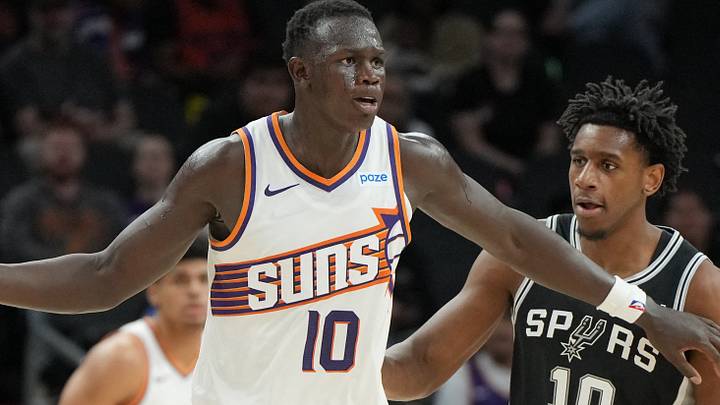 Oct 10, 2026; Phoenix, Arizona, USA; Phoenix Suns center Khaman Maluach (10) shields the ball from San Antonio Spurs center Tarris Reed Jr. (10) in the second half at Mortgage Matchup Center. Mandatory Credit: Rick Scuteri-Imagn Images Oct 10, 2026; Phoenix, Arizona, USA; Phoenix Suns center Khaman Maluach (10) shields the ball from San Antonio Spurs center Tarris Reed Jr. (10) in the second half at Mortgage Matchup Center. Mandatory Credit: Rick Scuteri-Imagn Images