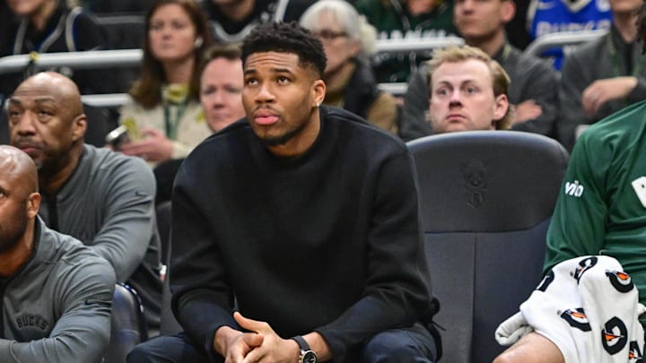 Dec 11, 2025; Milwaukee, Wisconsin, USA; Milwaukee Bucks forward Giannis Antetokounmpo (34) watches the game against the Boston Celtics from the bench in the second quarter at Fiserv Forum. Mandatory Credit: Benny Sieu-Imagn Images Dec 11, 2025; Milwaukee, Wisconsin, USA; Milwaukee Bucks forward Giannis Antetokounmpo (34) watches the game against the Boston Celtics from the bench in the second quarter at Fiserv Forum. Mandatory Credit: Benny Sieu-Imagn Images