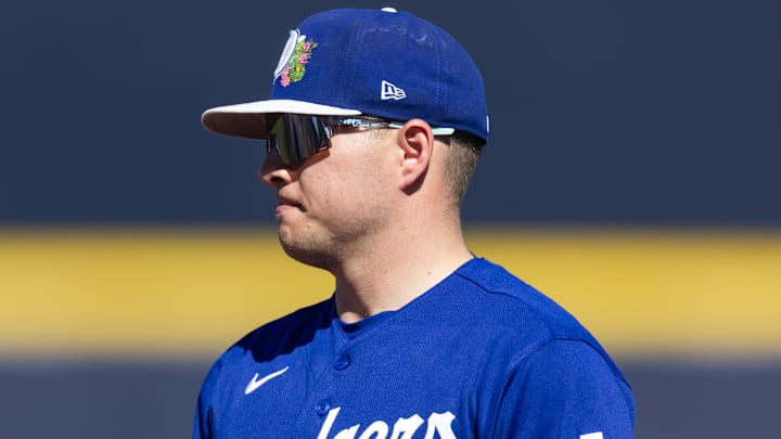 Feb 22, 2026; Peoria, Arizona, USA; Los Angeles Dodgers first baseman Ryan Ward against the San Diego Padres during a spring training game at Peoria Sports Complex. Mandatory Credit: Mark J. Rebilas-Imagn Images