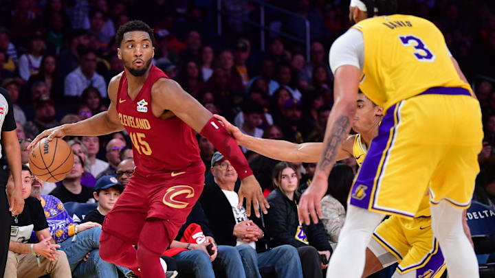 Dec 31, 2024; Los Angeles, California, USA; Cleveland Cavaliers guard Donovan Mitchell (45) moves the ball against the Los Angeles Lakers during the second half at Crypto.com Arena. Mandatory Credit: Gary A. Vasquez-Imagn Images Dec 31, 2024; Los Angeles, California, USA; Cleveland Cavaliers guard Donovan Mitchell (45) moves the ball against the Los Angeles Lakers during the second half at Crypto.com Arena. Mandatory Credit: Gary A. Vasquez-Imagn Images