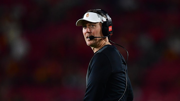 Sep 20, 2025; Los Angeles, California, USA; Southern California Trojans head coach Lincoln Riley watches game action against the Michigan State Spartans during the second half at the Los Angeles Memorial Coliseum. Mandatory Credit: Gary A. Vasquez-Imagn Images Sep 20, 2025; Los Angeles, California, USA; Southern California Trojans head coach Lincoln Riley watches game action against the Michigan State Spartans during the second half at the Los Angeles Memorial Coliseum. Mandatory Credit: Gary A. Vasquez-Imagn Images