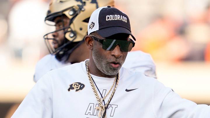 Colorado coach Deion Sanders stands on the field as the team warms up before a college football game between the Oklahoma State Cowboys (OSU) and the Colorado Buffaloes at Boone Pickens Stadium in Stillwater, Okla., Saturday, Oct. 24, 2026. Colorado coach Deion Sanders stands on the field as the team warms up before a college football game between the Oklahoma State Cowboys (OSU) and the Colorado Buffaloes at Boone Pickens Stadium in Stillwater, Okla., Saturday, Oct. 24, 2026.
