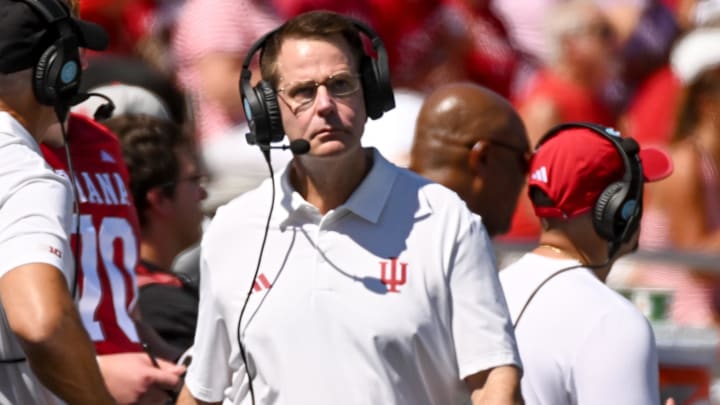 Indiana Hoosiers coach Curt Cignetti walks along the sideline during the first half against Old Dominion at Memorial Stadium.