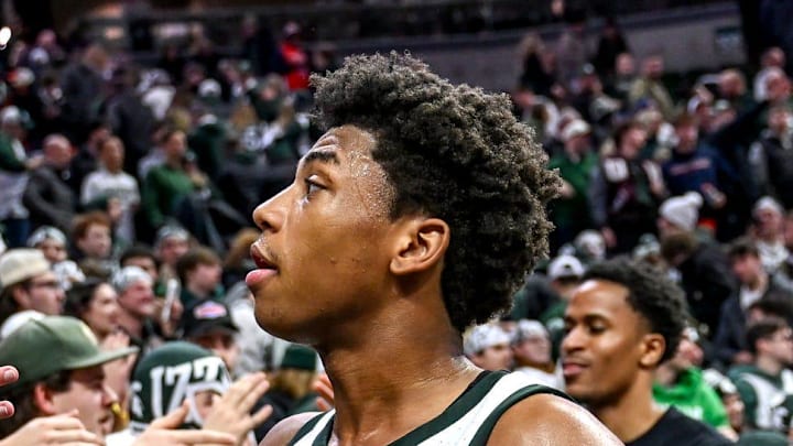 Michigan State's Jeremy Fears Jr. slaps hands with fans after the Spartans overtime win over Illinois on Saturday, Feb. 7, 2026, at the Breslin Center in East Lansing.