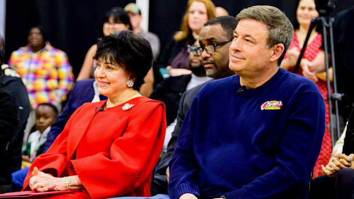 Dec 17, 2025; Baton Rouge, Louisiana, USA; New Orleans Pelicans governor Gayle Benson and Raising Cane's CEO Todd Graves sit during a press conference at the A.C. Lewis YMCA in Mid-City. Dec 17, 2025; Baton Rouge, Louisiana, USA; New Orleans Pelicans governor Gayle Benson and Raising Cane's CEO Todd Graves sit during a press conference at the A.C. Lewis YMCA in Mid-City.