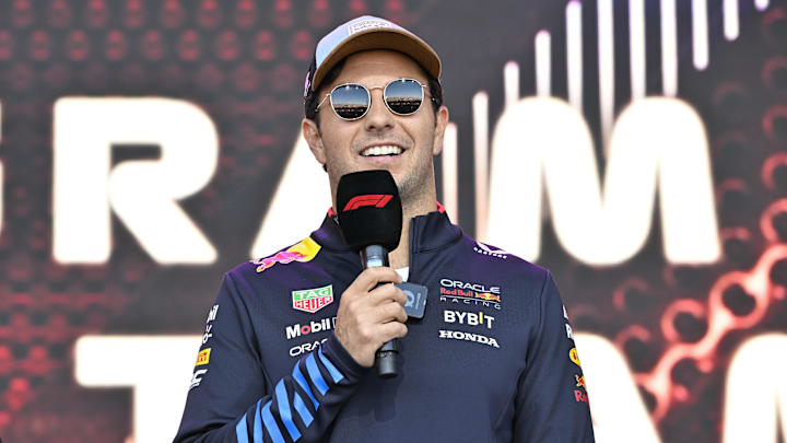 Oct 19, 2024; Austin, Texas, USA; Oracle Red Bull Racing driver Sergio Perez (11) of Team Mexico speaks to the crowd during a fan forum before the Sprint Race in the 2024 Formula One US Grand Prix at Circuit of the Americas. Mandatory Credit: Jerome Miron-Imagn Images