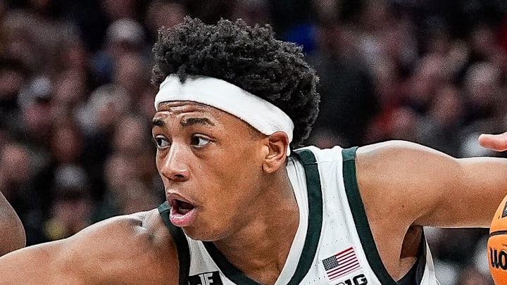 Michigan State guard Jeremy Fears Jr. (1) dribbles against Wisconsin guard John Blackwell (25) during the second half of Big Ten Tournament semifinal at Gainbridge Fieldhouse in Indianapolis, Ind. on Saturday, March 15, 2025. Michigan State guard Jeremy Fears Jr. (1) dribbles against Wisconsin guard John Blackwell (25) during the second half of Big Ten Tournament semifinal at Gainbridge Fieldhouse in Indianapolis, Ind. on Saturday, March 15, 2025.