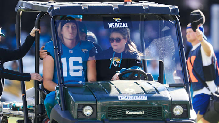 Jacksonville Jaguars quarterback Trevor Lawrence (16) is carted off the field after sustaining a heavy hit during the second quarter of an NFL football matchup Sunday, Dec. 1, 2024 at EverBank Stadium in Jacksonville, Fla. [Corey Perrine/Florida Times-Union]