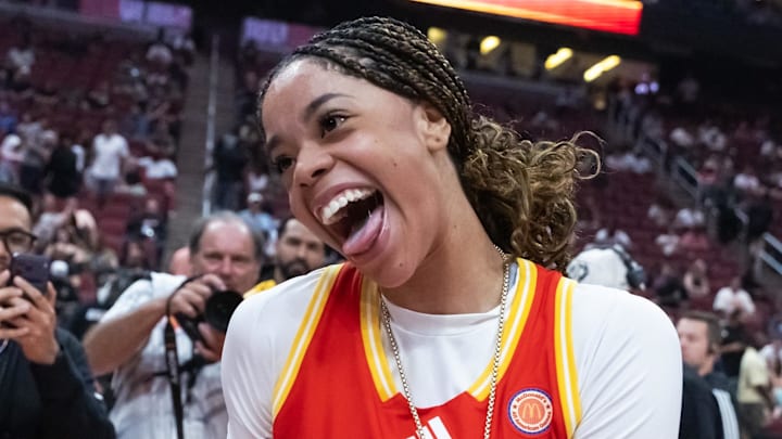 Mar 31, 2026; Glendale, AZ, USA; Saniyah Hall (2) celebrates with the player of the game trophy during the McDonalds All American Girls Game at Desert Diamond Arena. Mandatory Credit: Mark J. Rebilas-Imagn Images