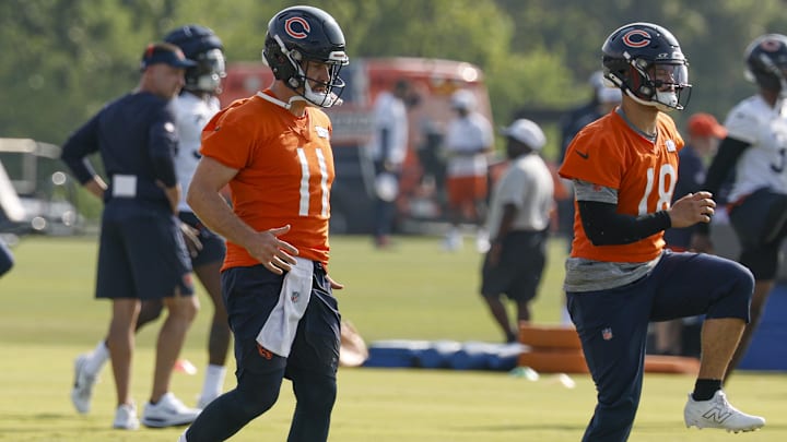 Jul 23, 2025; Lake Forest, IL, USA; Chicago Bears quarterbacks Austin Reed (16), Case Keenum (11) and Caleb Williams (18) warm up during training camp at Halas Hall. Mandatory Credit: Kamil Krzaczynski-Imagn Images
