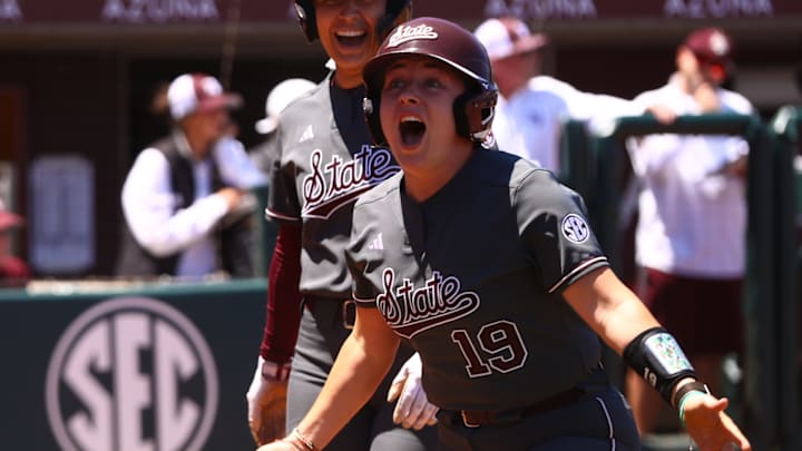 Mississippi State catcher Anna Carder reacts after scoring a run against Texas A&M in College Station, Texas.