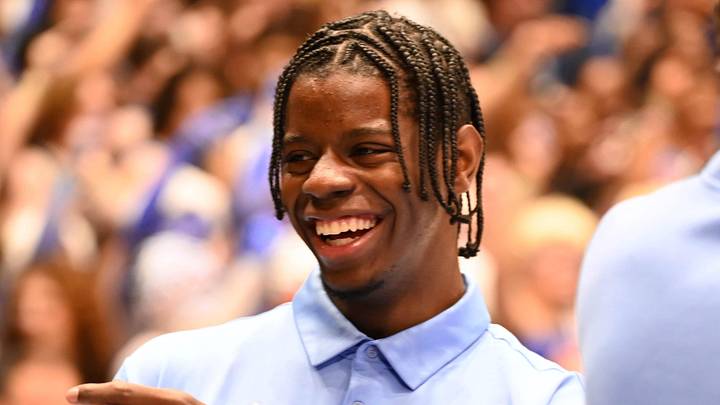 Mar 7, 2026; Durham, North Carolina, USA; Injured North Carolina Tar Heels foward Caleb Wilson jokes with teammates prior to a game against the Duke Blue Devils at Cameron Indoor Stadium.  The Duke Blue Devils won 76-61. Mandatory Credit: Rob Kinnan-Imagn Images
