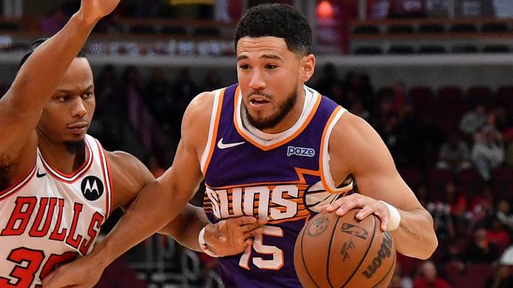 Oct 7, 2026; Chicago, Illinois, USA; Phoenix Suns guard Devin Booker (15) drives the ball against Chicago Bulls forward-guard Isaac Okoro (35) during the second half at United Center. Mandatory Credit: Patrick Gorski-Imagn Images Oct 7, 2026; Chicago, Illinois, USA; Phoenix Suns guard Devin Booker (15) drives the ball against Chicago Bulls forward-guard Isaac Okoro (35) during the second half at United Center. Mandatory Credit: Patrick Gorski-Imagn Images