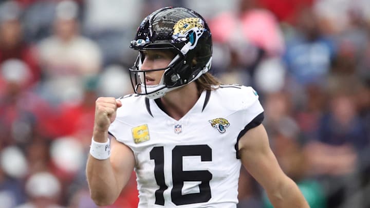 Nov 9, 2025; Houston, Texas, USA; Jacksonville Jaguars quarterback Trevor Lawrence (16) reacts after a first down against the Houston Texans during the second half at NRG Stadium. Mandatory Credit: Troy Taormina-Imagn Images