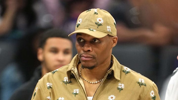 Apr 3, 2026; Sacramento, California, USA; Sacramento Kings guard Russell Westbrook (center) stands on the court during a timeout in the second quarter against the New Orleans Pelicans at Golden 1 Center. Mandatory Credit: Darren Yamashita-Imagn Images