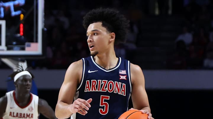 Dec 13, 2025; Birmingham, Alabama, USA; Arizona Wildcats guard Brayden Burries (5) dribbles down court during the second half against the Alabama Crimson Tide at Legacy Arena at BJCC. Mandatory Credit: David Leong-Imagn Images