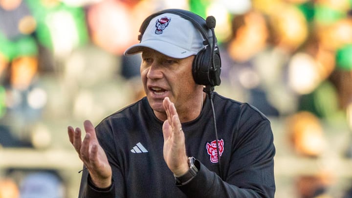 Oct 11, 2025; South Bend, Indiana, USA; NC State Wolfpack head coach Dave Doeren claps as he walks onto the field against the Notre Dame Fighting Irish during the second half at Notre Dame Stadium. Mandatory Credit: Michael Caterina-Imagn Images Oct 11, 2025; South Bend, Indiana, USA; NC State Wolfpack head coach Dave Doeren claps as he walks onto the field against the Notre Dame Fighting Irish during the second half at Notre Dame Stadium. Mandatory Credit: Michael Caterina-Imagn Images