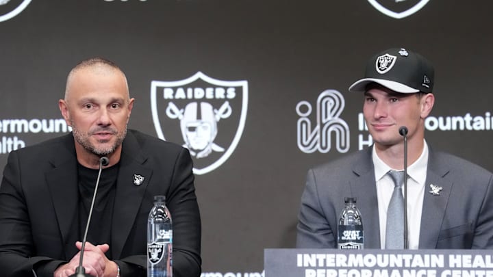 Apr 24, 2026; Henderson, NV, USA; Las Vegas Raiders quarterback Fernando Mendoza (right) and general manager John Spytek at introductory press conference at Intermountain Health Performance Center after being selected as the No. 1 pick in the 2026 NFL Draft. Mandatory Credit: Kirby Lee-Imagn Images