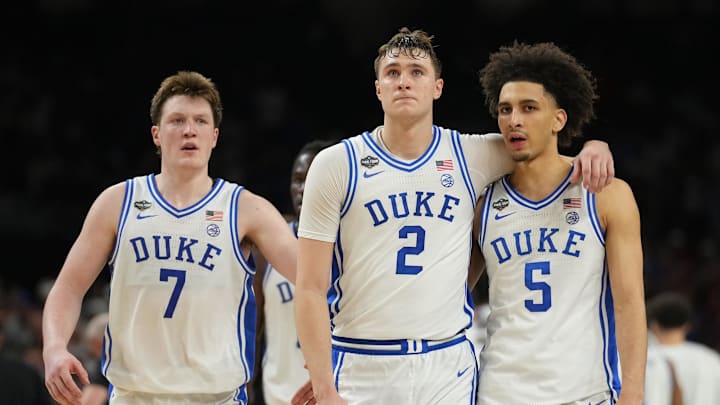 Duke Blue Devils forward Cooper Flagg, guard Tyrese Proctor and guard Kon Knueppel react during the Final Four.