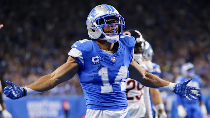 Detroit Lions wide receiver Amon-Ra St. Brown (14) celebrates after a play against the Chicago Bears 