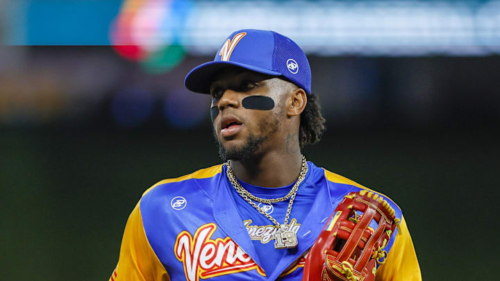 Mar 14, 2023; Miami, Florida, USA; Venezuela center fielder Ronald Acuna Jr. (42) runs toward the dugout after the fourth inning against Nicaragua at LoanDepot Park. Mandatory Credit: Sam Navarro-Imagn Images Mar 14, 2023; Miami, Florida, USA; Venezuela center fielder Ronald Acuna Jr. (42) runs toward the dugout after the fourth inning against Nicaragua at LoanDepot Park. Mandatory Credit: Sam Navarro-Imagn Images