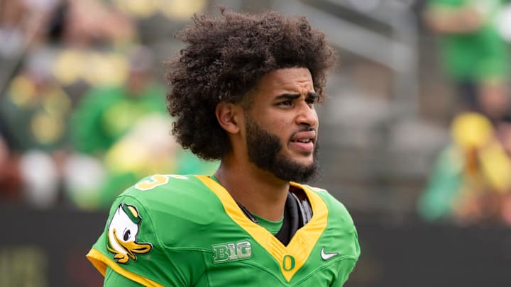 Oregon quarterback Dante Moore warms up as the Oregon Ducks host the Oklahoma State Cowboys on Sept. 6, 2025, at Autzen Stadium in Eugene, Oregon.