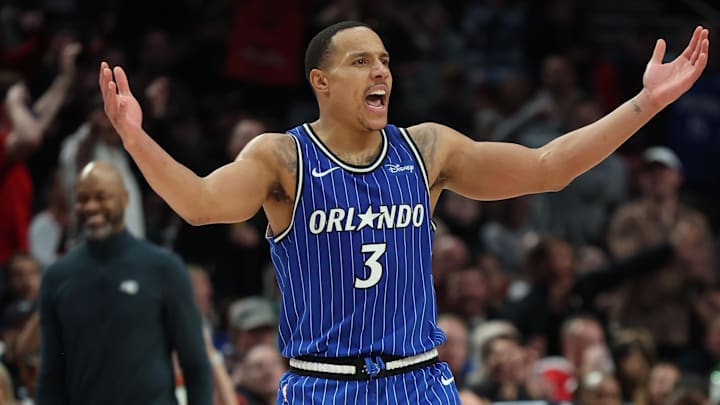 Dec 23, 2025; Portland, Oregon, USA;  Orlando Magic guard Desmond Bane (3) reacts after a play against the Portland Trail Blazers during the second half at Moda Center. Mandatory Credit: Jaime Valdez-Imagn Images