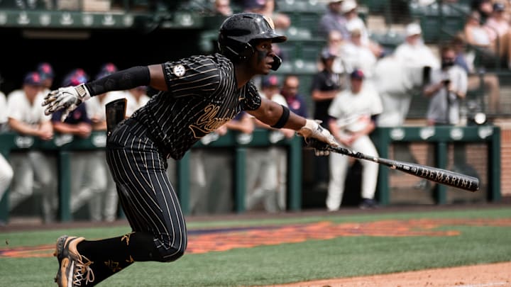 Vanderbilt outfielder RJ Austin begins his run to first base during the Commodores' big five-run, fifth inning against Auburn on Saturday. Vanderbilt outfielder RJ Austin begins his run to first base during the Commodores' big five-run, fifth inning against Auburn on Saturday.