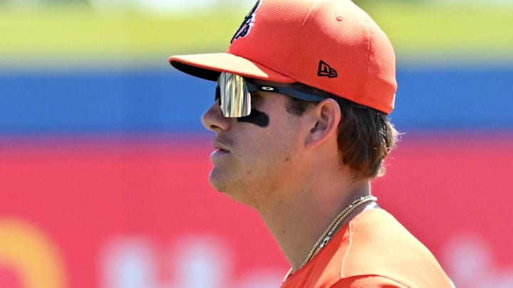 Baltimore Orioles third baseman Coby Mayo (86) warms up before the start of the spring training game against the Toronto Blue Jays at TD Ballpark in Dunedin, Fla., on March 19, 2024. Baltimore Orioles third baseman Coby Mayo (86) warms up before the start of the spring training game against the Toronto Blue Jays at TD Ballpark in Dunedin, Fla., on March 19, 2024.
