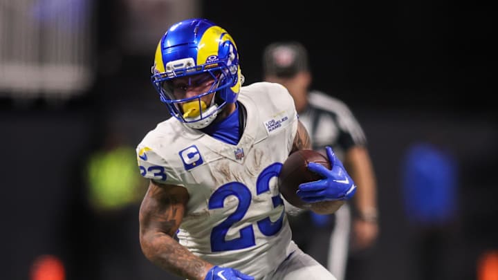 Dec 29, 2025; Atlanta, Georgia, USA; Los Angeles Rams running back Kyren Williams (23) runs the ball against the Atlanta Falcons in the fourth quarter at Mercedes-Benz Stadium. Mandatory Credit: Brett Davis-Imagn Images