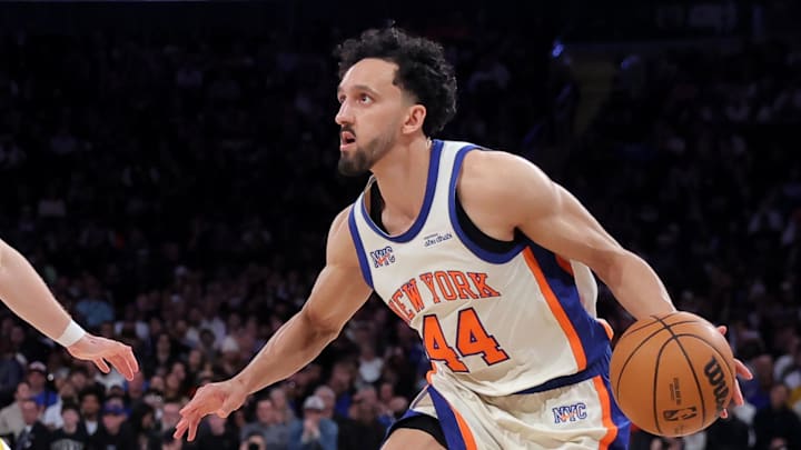 Mar 15, 2026; New York, New York, USA; New York Knicks guard Landry Shamet (44) controls the ball against Golden State Warriors guard Brandin Podziemski (2) during the fourth quarter at Madison Square Garden. Mandatory Credit: Brad Penner-Imagn Images