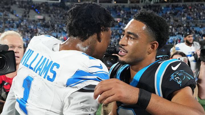 Detroit Lions wide receiver Jameson Williams (1) hugs Carolina Panthers quarterback Bryce Young (9) after the game Detroit Lions wide receiver Jameson Williams (1) hugs Carolina Panthers quarterback Bryce Young (9) after the game