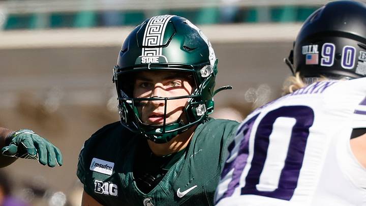 Michigan State quarterback Alessio Milivojevic (11) looks to throw against Northwestern at Spartan Stadium on Saturday, Oct. 17, 2026