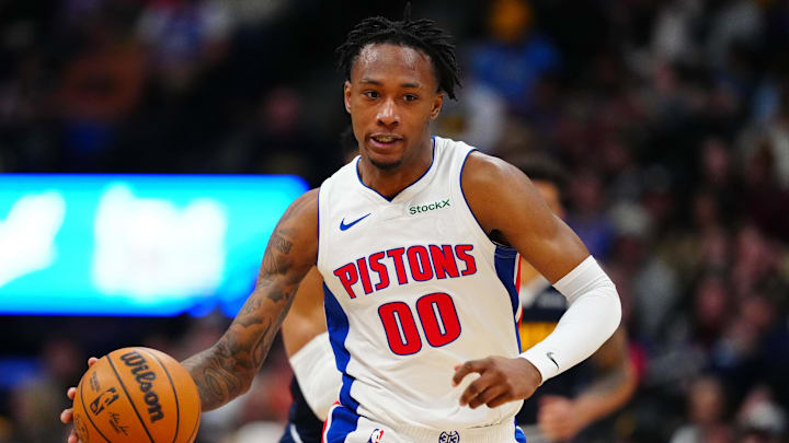 Dec 28, 2024; Denver, Colorado, USA; Detroit Pistons forward Ronald Holland II (00) dribbles up court in the second half against the Denver Nuggets at Ball Arena. Mandatory Credit: Ron Chenoy-Imagn Images