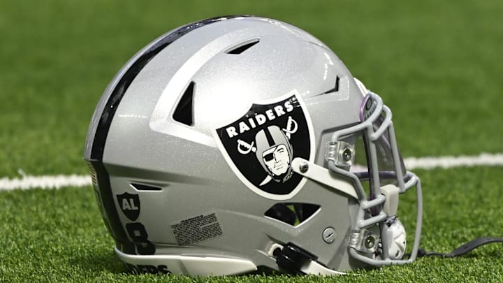 Oct 20, 2024; Inglewood, California, USA; Las Vegas Raiders helmet on the turn at SoFi Stadium during pregame warmups before an NFL game against the Los Angeles Rams. Mandatory Credit: Robert Hanashiro-Imagn Images