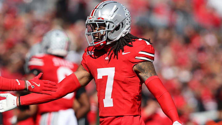 Oct 26, 2024; Columbus, Ohio, USA; Ohio State Buckeyes cornerback Jordan Hancock (7) celebrates a tackle for a loss during the second quarter against the Nebraska Cornhuskers at Ohio Stadium. Mandatory Credit: Joseph Maiorana-Imagn Images