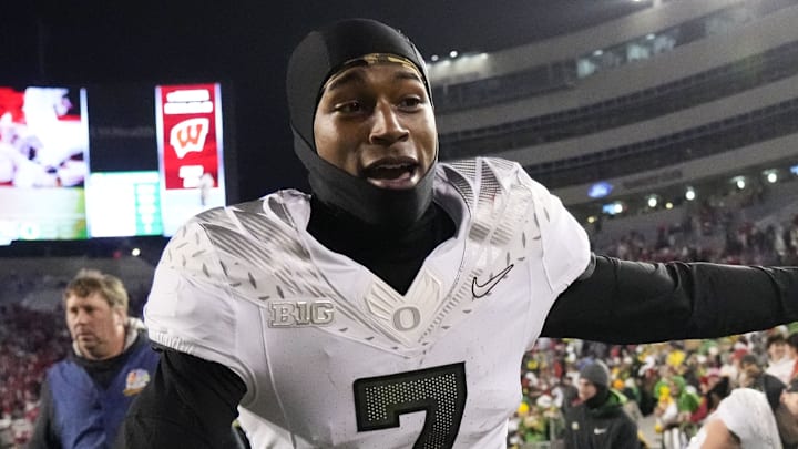 Nov 16, 2024; Madison, Wisconsin, USA;  Oregon Ducks wide receiver Evan Stewart (7) greets fans following the game against the Wisconsin Badgers at Camp Randall Stadium. Mandatory Credit: Jeff Hanisch-Imagn Images
