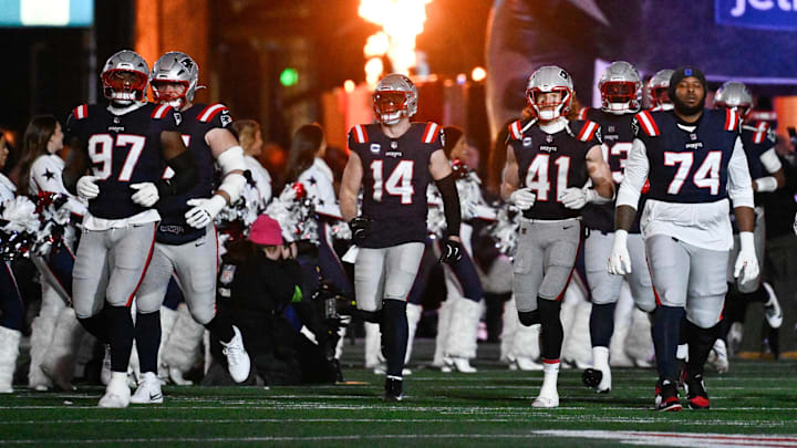 Jan 11, 2026; Foxborough, MA, USA; The New England Patriots take the field before the game against the Los Angeles Chargers in an AFC Wild Card Round game at Gillette Stadium. Mandatory Credit: Eric Canha-Imagn Images