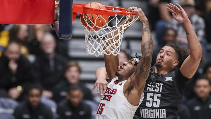 Feb 8, 2026; Morgantown, West Virginia, USA; Texas Tech Red Raiders forward JT Toppin (15) dunks the ball during the first half against the West Virginia Mountaineers at Hope Coliseum. Mandatory Credit: Ben Queen-Imagn Images