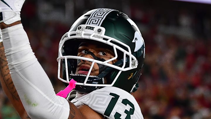 Sep 20, 2025; Los Angeles, California, USA; Michigan State Spartans wide receiver Chrishon McCray (13) celebrates his touchdown scored against the Southern California Trojans during the first half at the Los Angeles Memorial Coliseum. Sep 20, 2025; Los Angeles, California, USA; Michigan State Spartans wide receiver Chrishon McCray (13) celebrates his touchdown scored against the Southern California Trojans during the first half at the Los Angeles Memorial Coliseum.