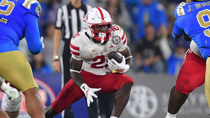 Emmett Johnson's 100-yard rushing, 100-yard receiving day was crucial in the Huskers' victory against UCLA